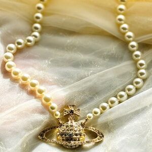Vivienne Westwood Jumbo Pearl Saturn Orb Gold Austrian Crystal Necklace